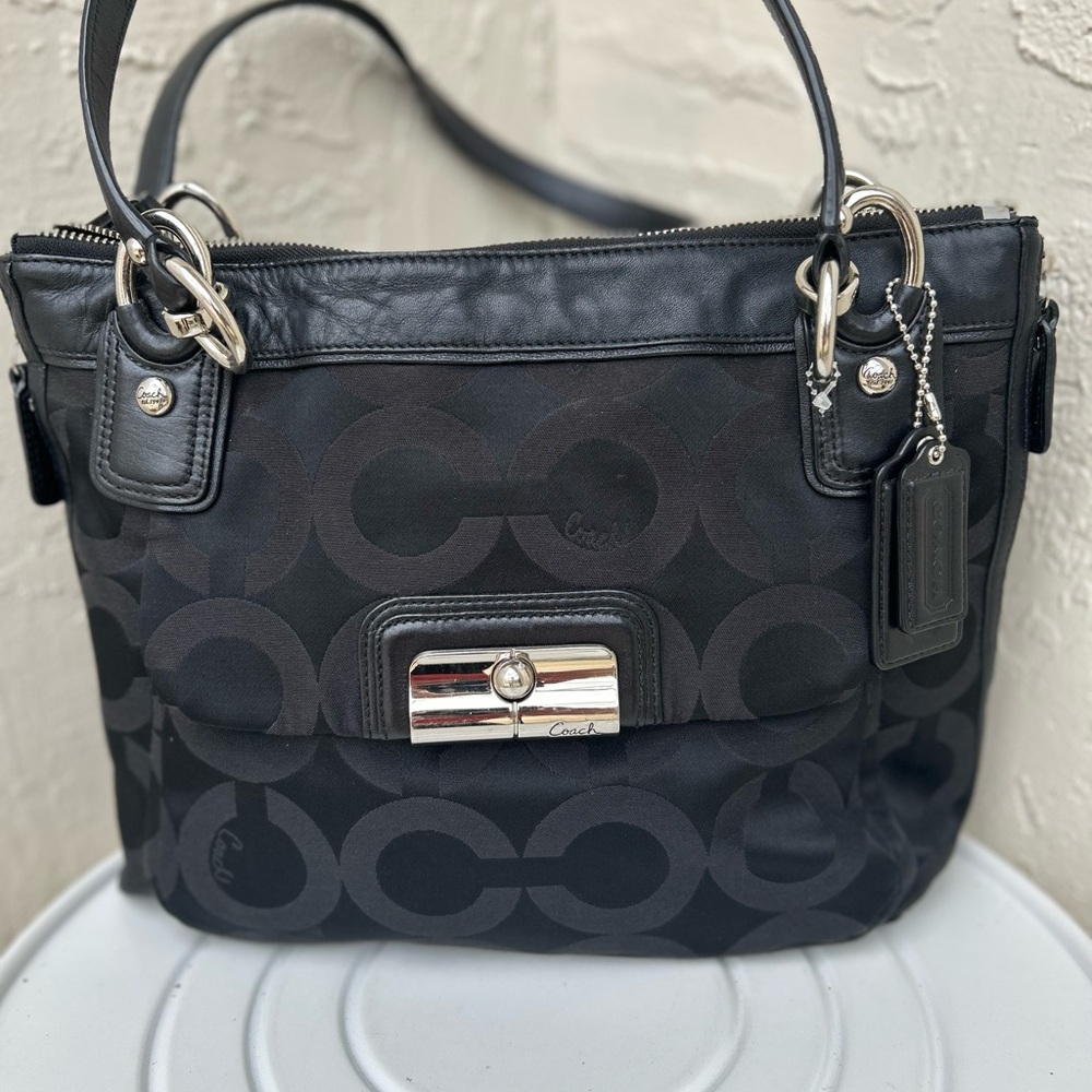 Coach Kristin hobo shoulder bag, identified by its signature Canvas Black 18271